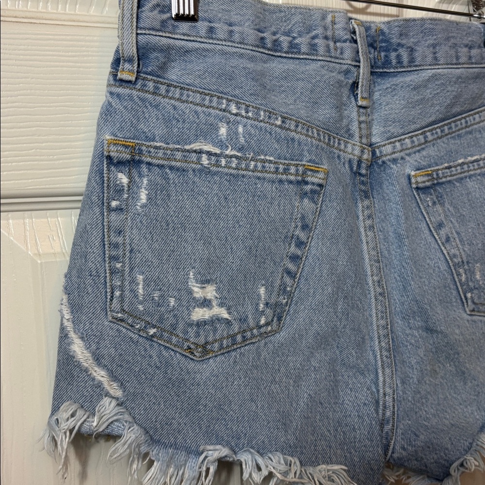 Agolde Light Blue Distressed Denim Cutoff Shorts - Picture 6 of 10